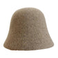 A women's hat made of wool felt, with a hemispherical crown, a cylindrical body, and a short brim. It was the signature women's hat of the 1920s.