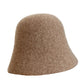 A women's hat made of wool felt, with a hemispherical crown, a cylindrical body, and a short brim. It was the signature women's hat of the 1920s.