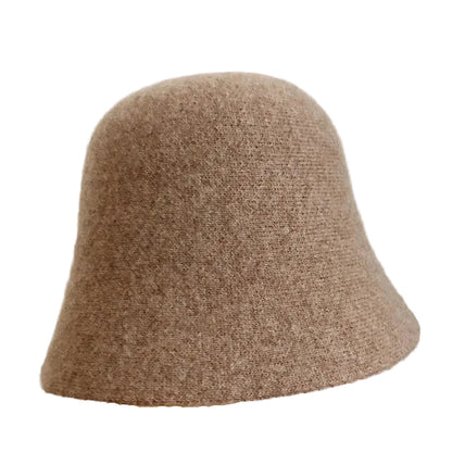 A women's hat made of wool felt, with a hemispherical crown, a cylindrical body, and a short brim. It was the signature women's hat of the 1920s.