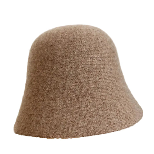 A women's hat made of wool felt, with a hemispherical crown, a cylindrical body, and a short brim. It was the signature women's hat of the 1920s.