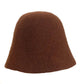 A women's hat made of wool felt, with a hemispherical crown, a cylindrical body, and a short brim. It was the signature women's hat of the 1920s.